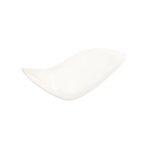 White, wave-shaped ceramic dish.