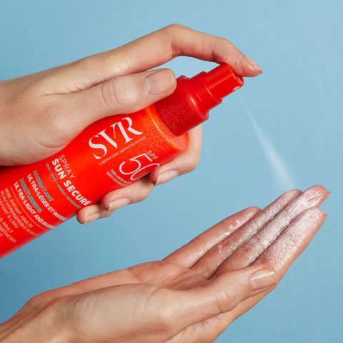 SVR spf 50 milk is sprayed on the body