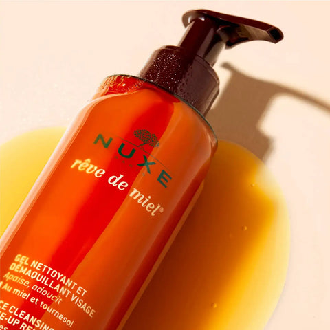 Orange Nuxe face cleanser bottle with pump.