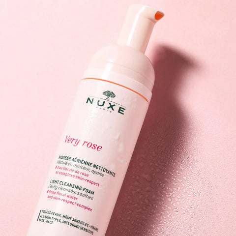 Pink and white Nuxe Very Rose cleansing foam bottle.