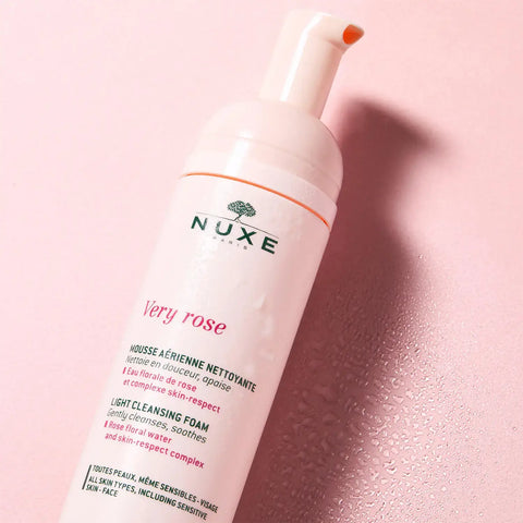 Pink and white Nuxe Very Rose cleansing foam bottle.