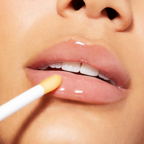 Lip gloss application, close-up on lips, 4_d2baac6e-ed84-44c1