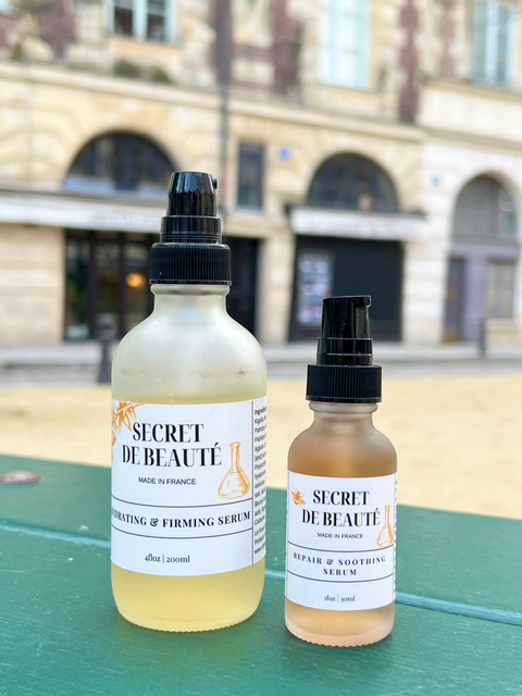 Secret de beaute bottles on a bench place Dauphine