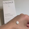 Caudalie vinoperfect applied on hand